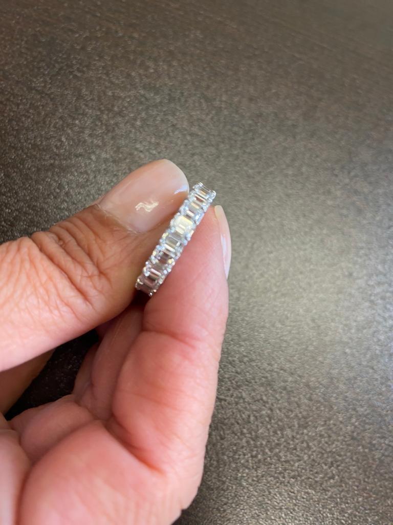 4.50 Carat Emerald Platinum Eternity Ring In New Condition For Sale In Great Neck, NY