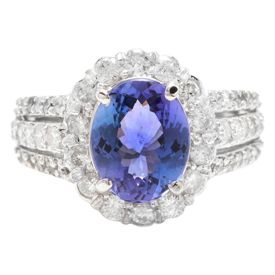 4.50 Carat Natural Very Nice Looking Tanzanite and Diamond 18 Karat Solid Gold