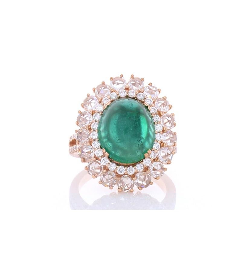 This is a vintage-inspired cocktail ring featuring one dome-shaped cabochon emerald center stone with a weight of 5.91 carats double prong set in the center. The gem source is Brazil. Its color is vibrant green with excellent luster and