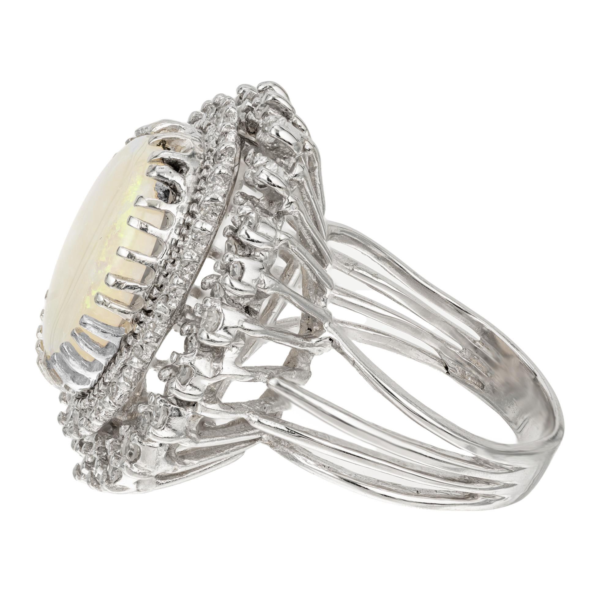 Women's 4.50 Carat Oval Opal Diamond Halo Gold Mid Century Cocktail Ring For Sale