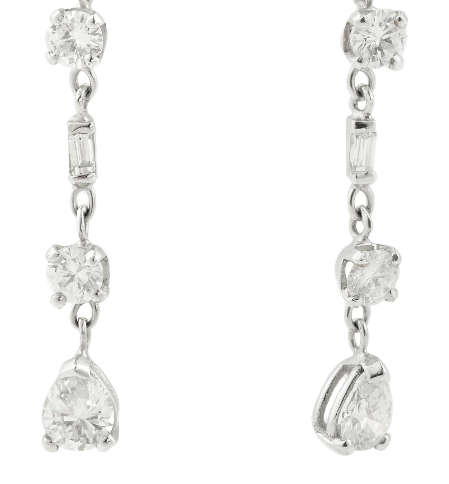 Contemporary 4.50 Carat Pear, Round and Baguette Cut Diamonds 18 Karat White Gold Earrings For Sale