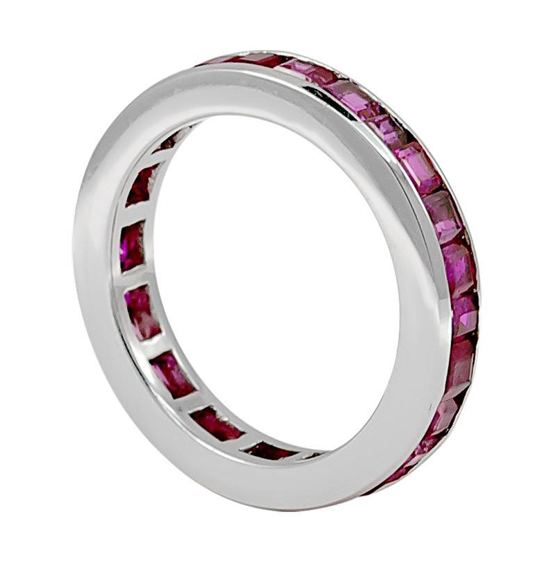 A bold yet daring channel set eternity ring containing 4.50 carats of Pink Sapphires. This ring measures  0.14