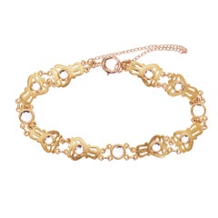 Pulsera Art Nouveau de oro calado con circonitas azules redondas de 4,50 quilates