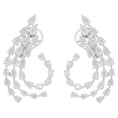 Boucles d
oreilles en or blanc 18 carats avec diamants poire de 4,50 carats de pureté SI de couleur hi-colore