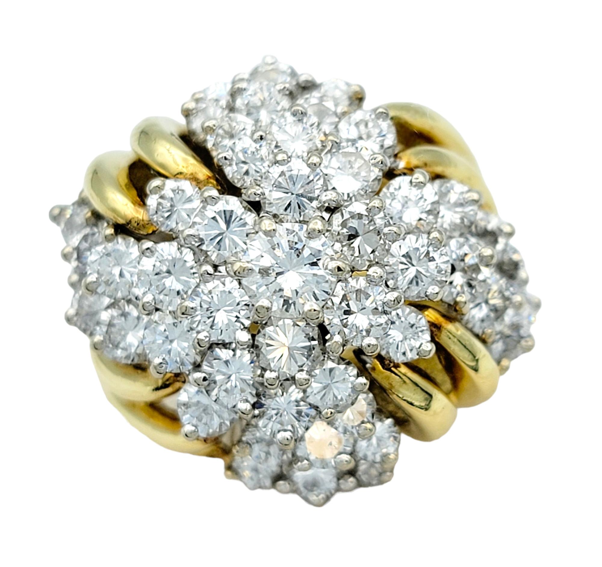 Ring Size: 7.25

Exuding unparalleled elegance and sophistication, this diamond dome ring is a captivating testament to luxury, crafted from sumptuous 18 karat yellow gold. At its heart lies a dazzling array of diamonds meticulously arranged in a