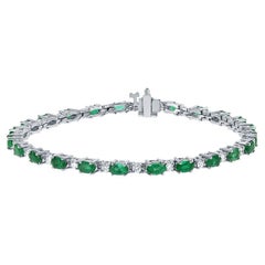 4,50 Karat Gesamtgewicht Ovaler Smaragd & Runder Diamant Armband