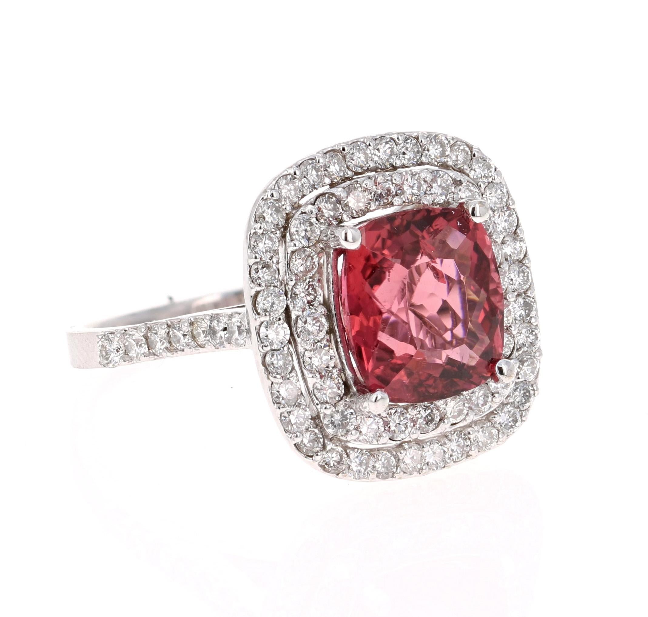 Gorgeous & Unique Cocktail Ring!

This ring has a pretty Cushion Cut Orangish-Mauve Tourmaline that weighs 3.34 Carats. Floating around the tourmaline is 72 Round Cut Diamonds that weighs 1.16 Carats. The total carat weight of the ring is 4.50
