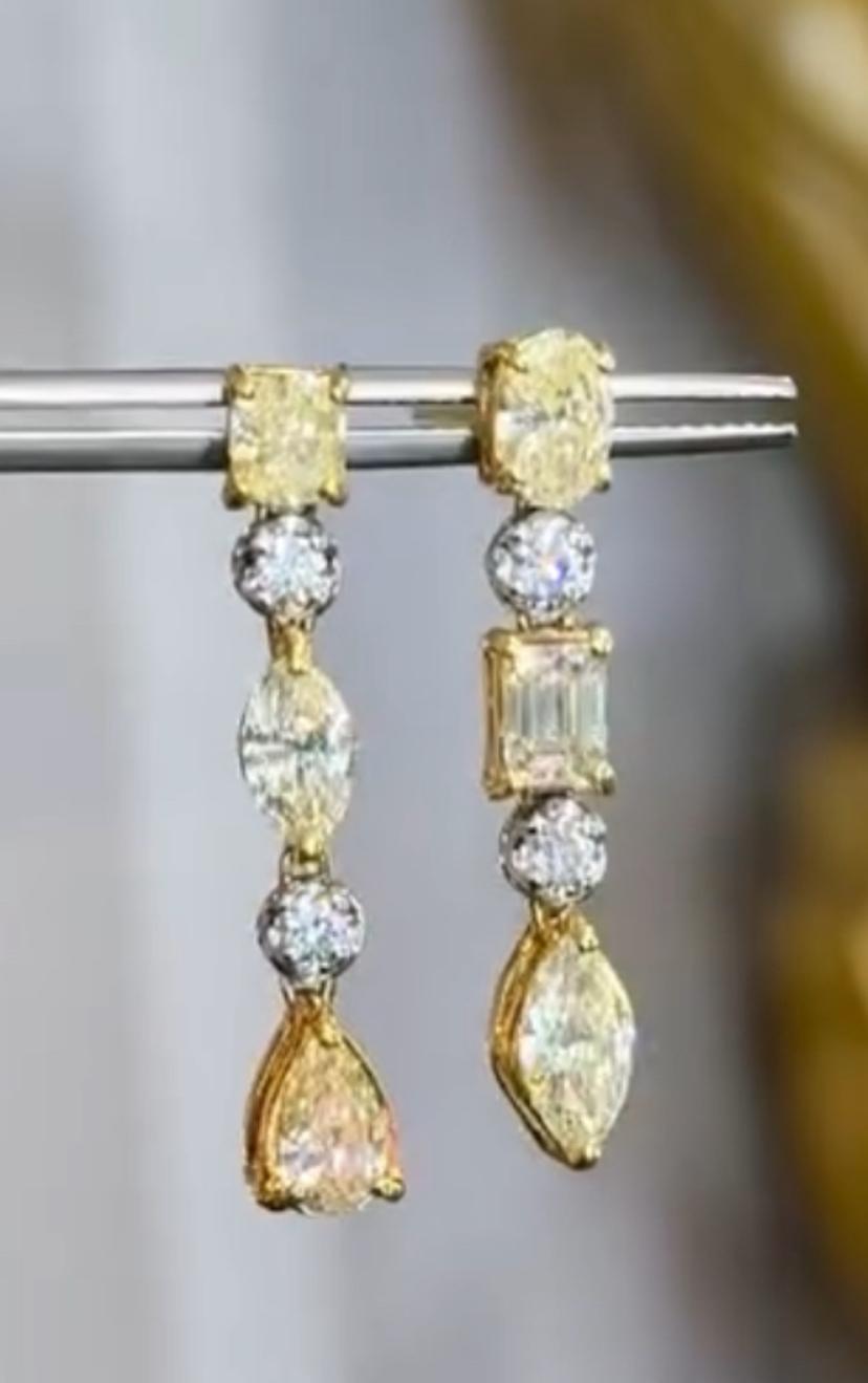 An exquisite Fancy Diamonds earrings, in a contemporary design, so elegant and refined design.
Elevate your timeless of beauty and add a touch of class and color on your look.
Stunning earrings come in 18K Gold with 6 pieces of lustrous Fancy Yellow