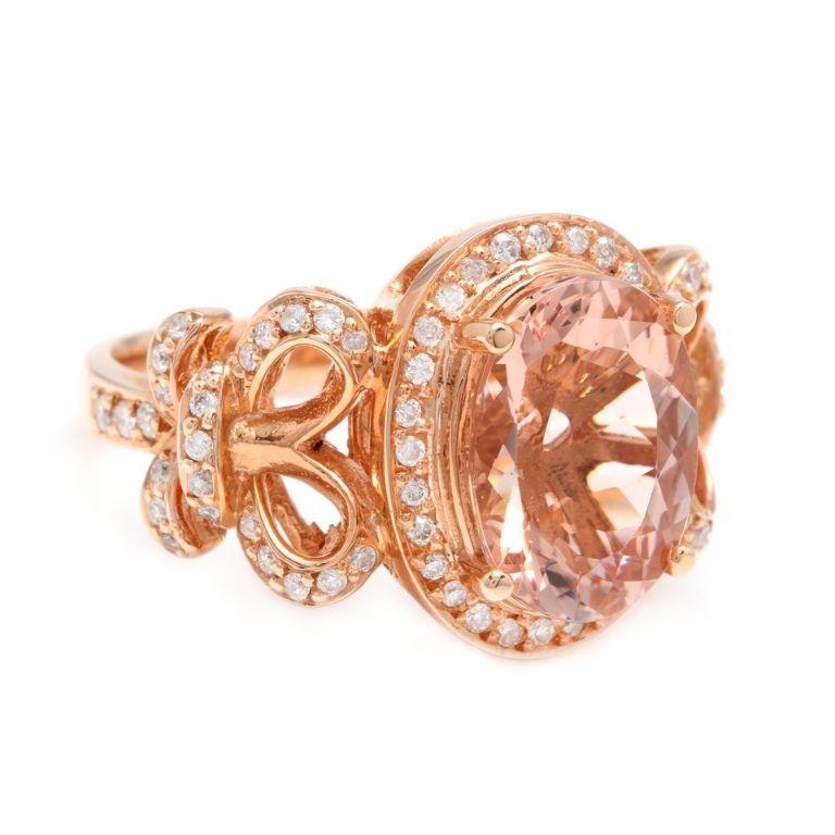 4.50 Carats Impressive Natural Morganite and Diamond 14K Solid Rose Gold Ring

Total Morganite Weight is: Approx. 4.00 Carats

Morganite Treatment: Heating

Morganite Measures: Approx. 11.00 x 9.00mm

Natural Round Diamonds Weight: Approx. 0.50