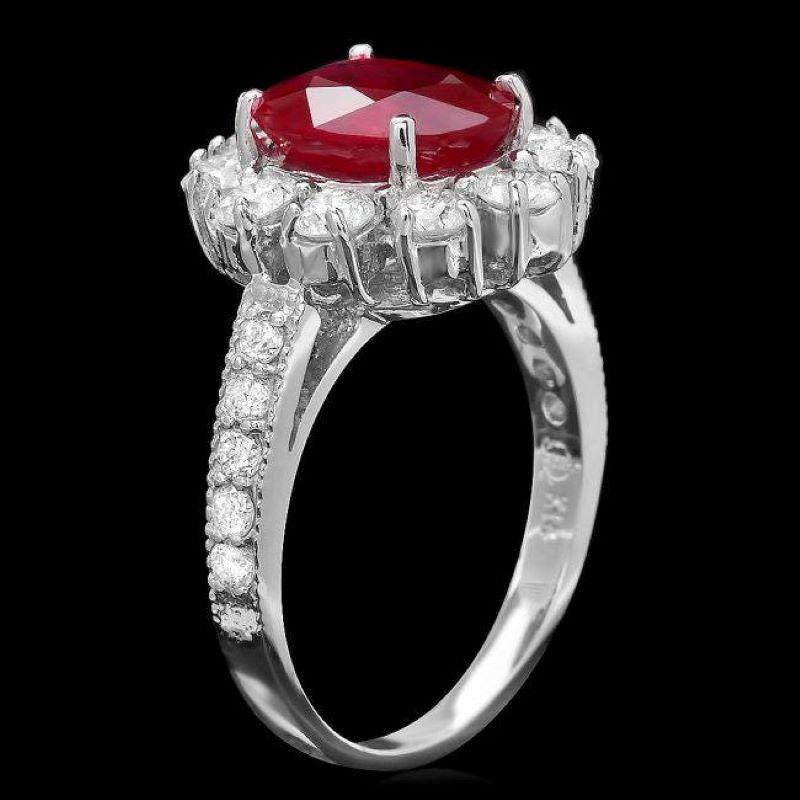4.bague en or blanc massif 14K, rubis rouge naturel de 50 carats et diamant

Le poids total du rubis rouge est de : Environ 3,10 carats 

Mesures du rubis : Environ 10.00 x 8.00mm

Traitement du rubis : Remplissage des fractures

Diamants ronds