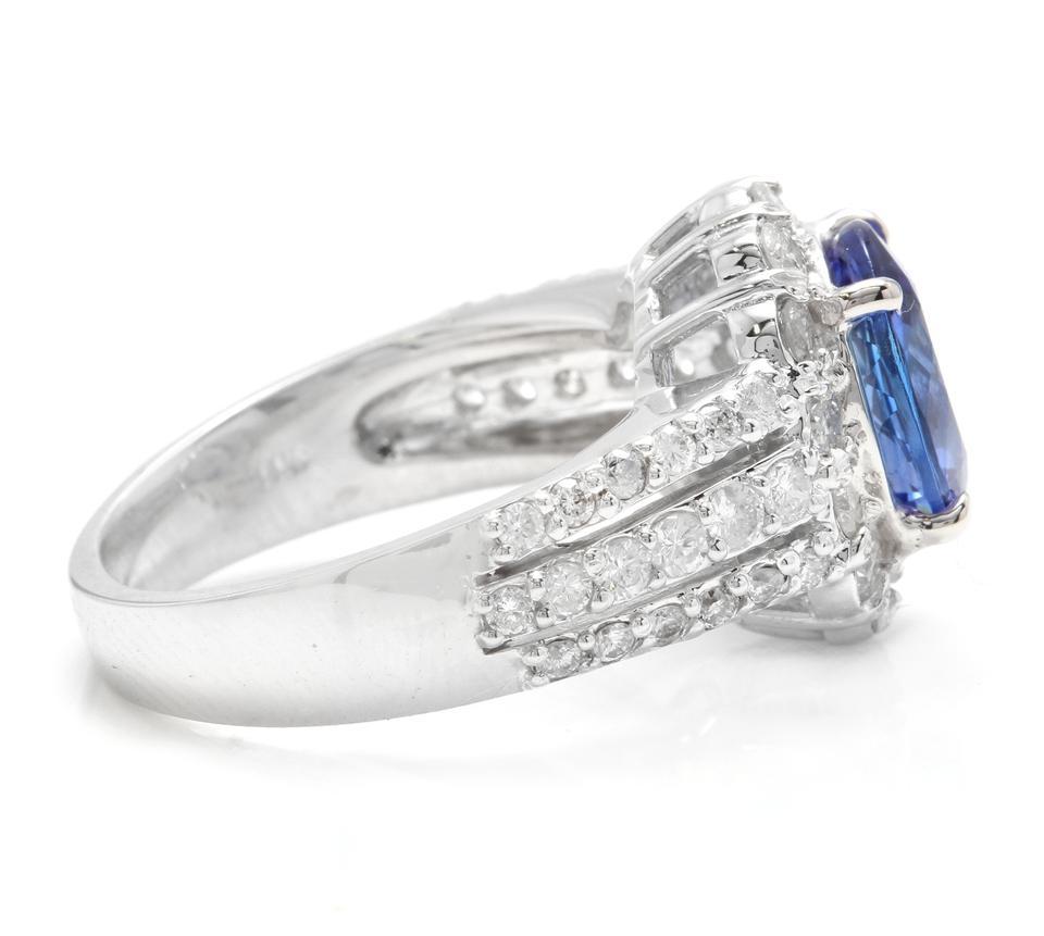 Oval Cut 4.50 Carat Natural Tanzanite and Diamond 18 Karat Solid White Gold Ring For Sale