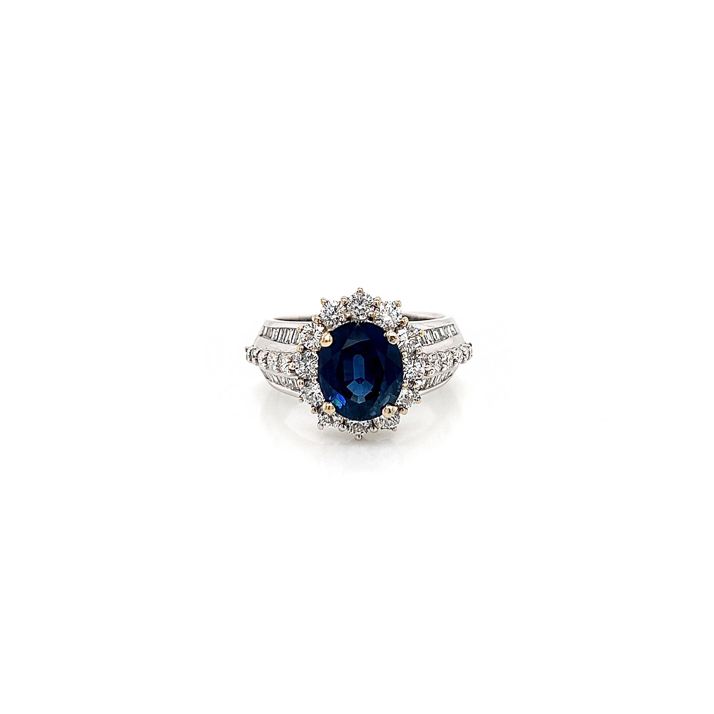 4.50 Total Carat Sapphire and Diamond Ladies Ring

-Metal Type: 18K White Gold
-3.05 Carat Oval Cut Natural Blue Sapphire
-1.05 Carat Prong-Set Round Natural Diamonds. F-G Color, VS-SI Clarity 
-0.40 Carat Channel-Set Baguette Natural Diamonds. F-G