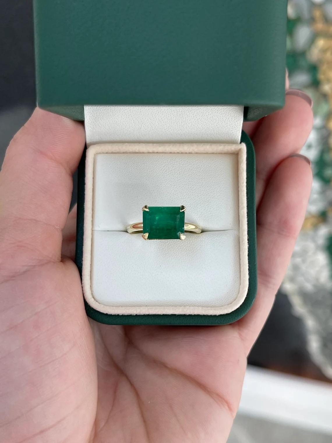 Modern 4.50ct 14K Rich Forest Green Emerald Cut Emerald East to West 4 Prong Set Ring For Sale