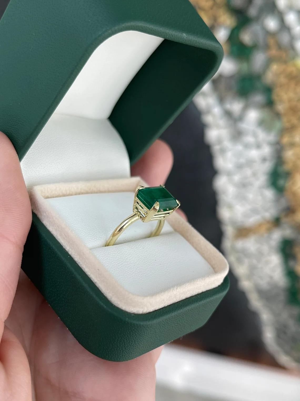 4.50ct 14K Rich Forest Green Emerald Cut Emerald East to West 4 Prong Set Ring In New Condition For Sale In Jupiter, FL