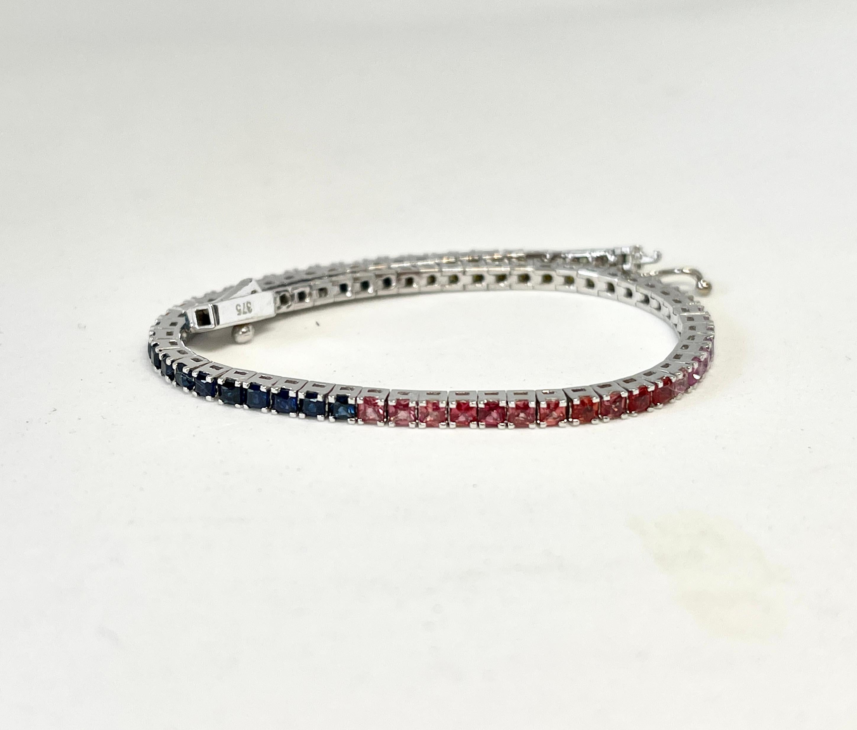 Wear a Rainbow on your Wrist!
This colourful, high quality bracelet features 4.63cts of varying coloured, Natural Sapphires set in 9ct white gold. 
The bracelet is good quality and well made.  
The stars of this piece are the multi-coloured,
