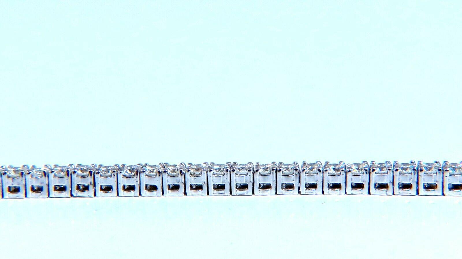 Diamond tennis bracelet.

4.50 carat natural round diamonds.

63 diamonds

G- color vs2 clarity.

14kt white gold 11.7 grams.

Bracelet measures 2.8mm wide

$19,000 appraisal certificate to accompany