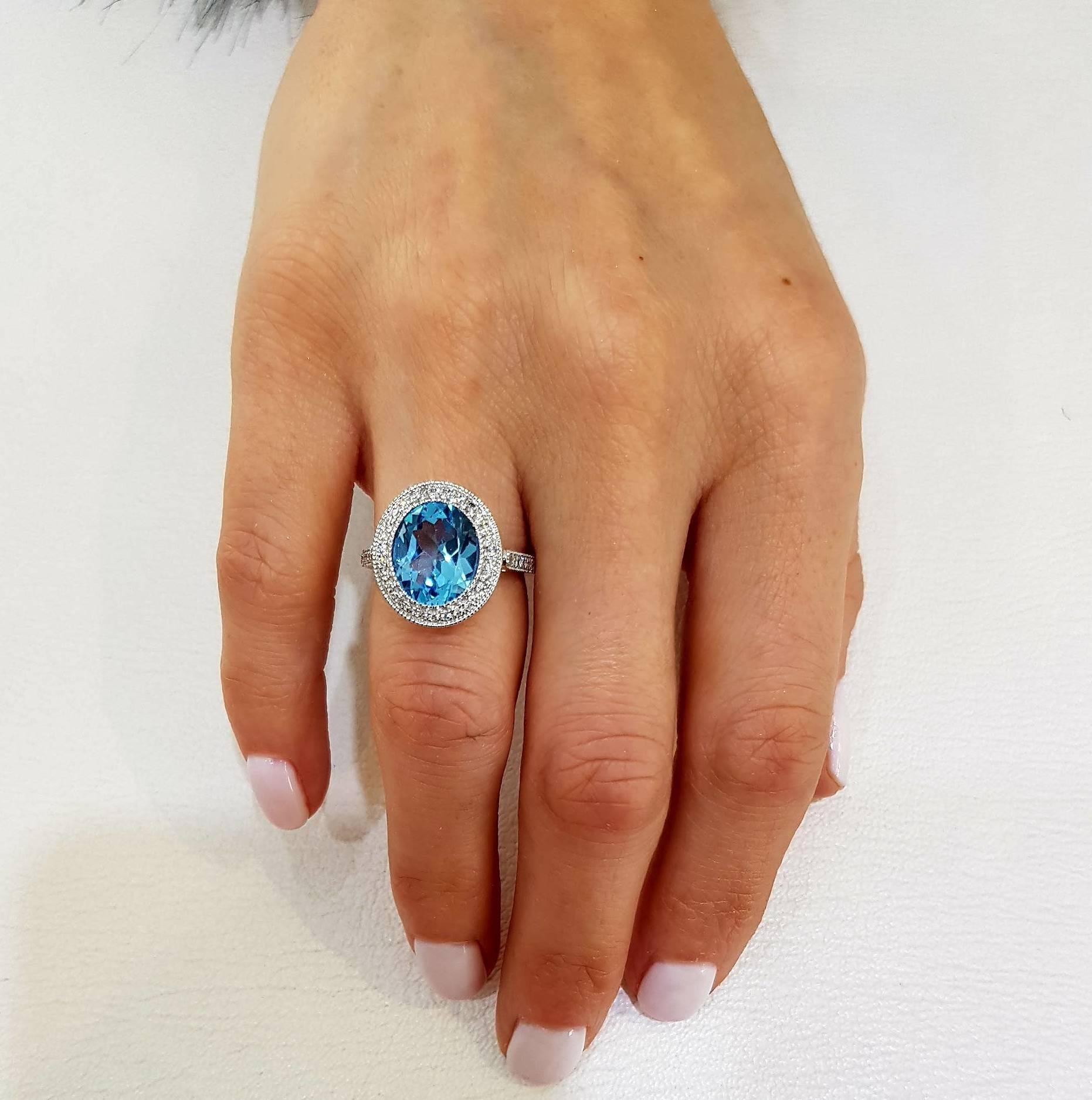 oval blue topaz ring with diamonds