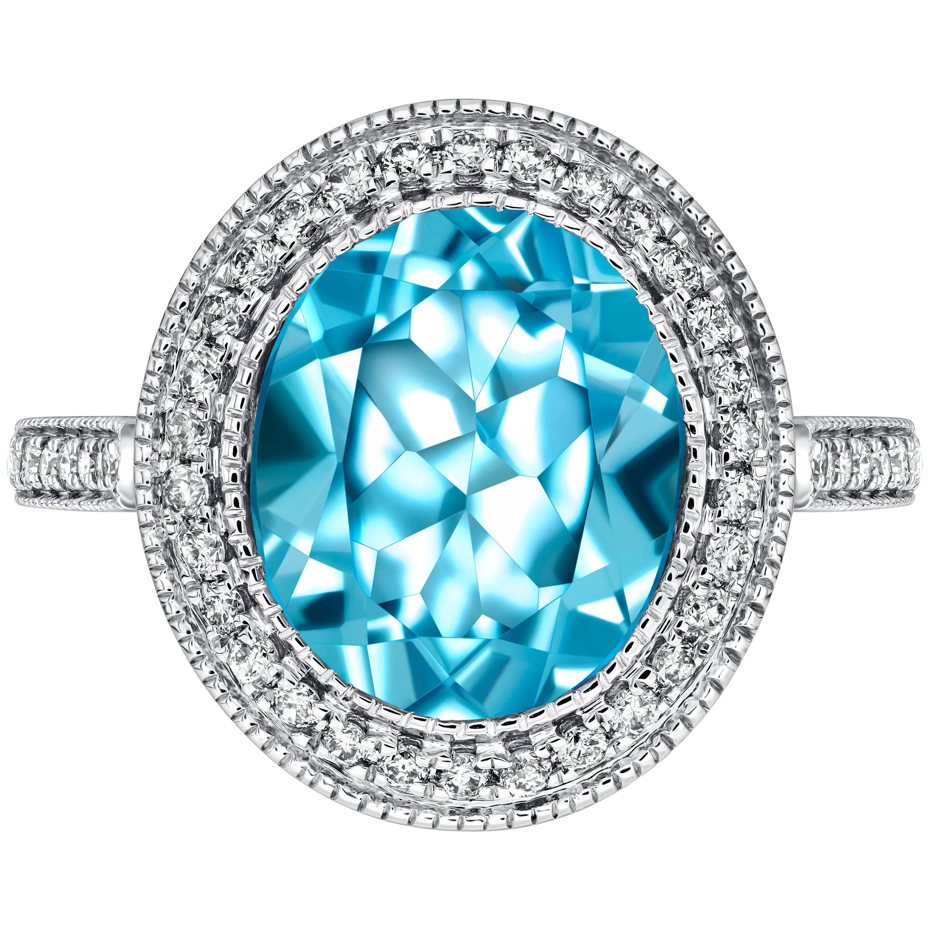 Bague de fiançailles en or blanc 18 carats avec topaze bleue ovale de 4,50 carats et diamant rond de 0,33 carat