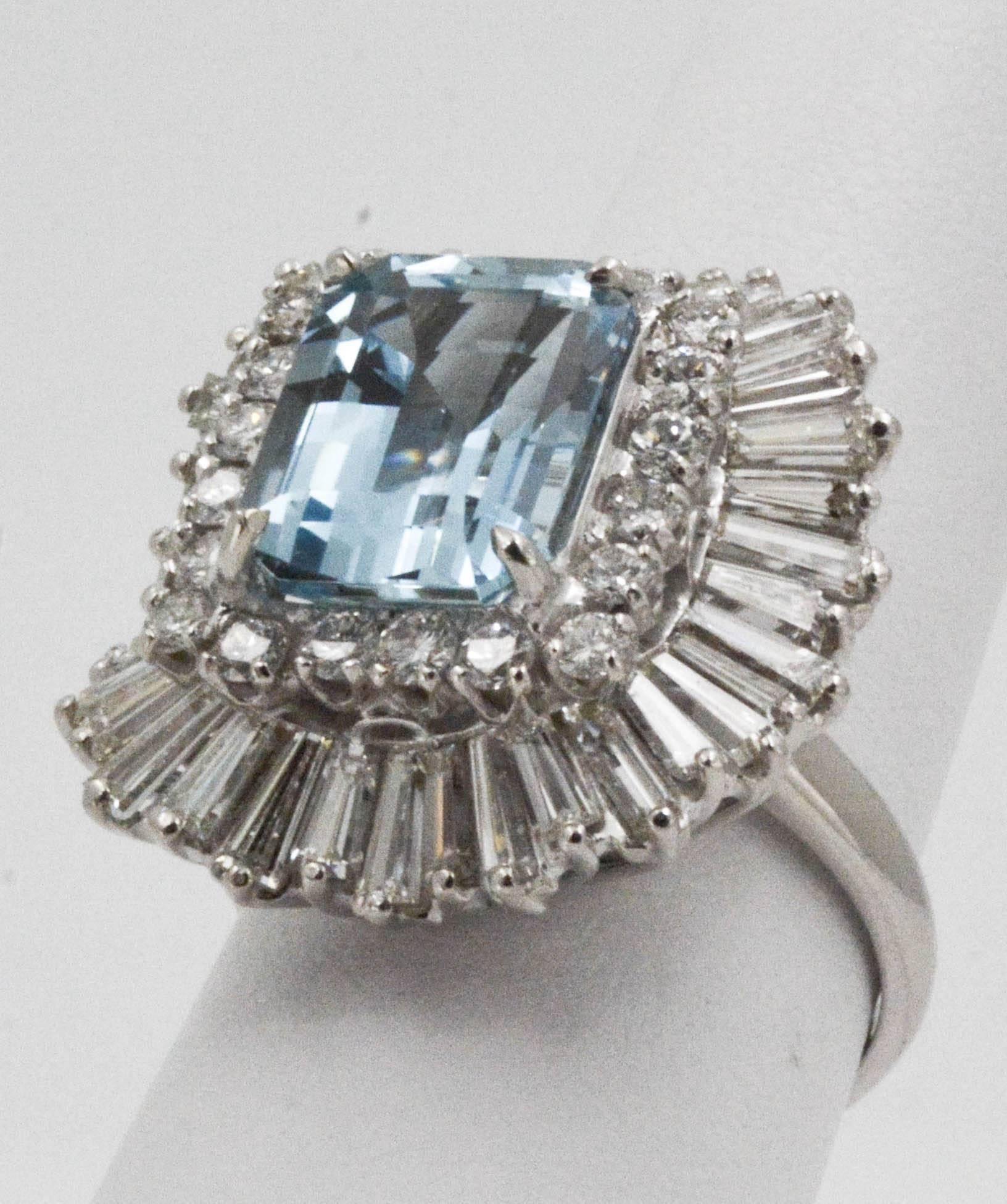 Crystal clear waters would not capture your attention more than this 4.51 ctw emerald cut Aquamarine. Its universal appeal in soft blue is complemented with 20 round brilliant cut diamonds and 40 tapered bagguette diamonds (3.75 carat total weight,