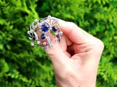 4.52 Carat Basaltic Sapphire 3.87 Carat Diamond 18k White Gold Brooch Circa 1910