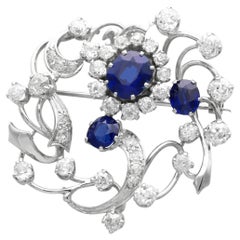 4.52 Carat Basaltic Sapphire 3.87 Carat Diamond 18k White Gold Brooch Circa 1910