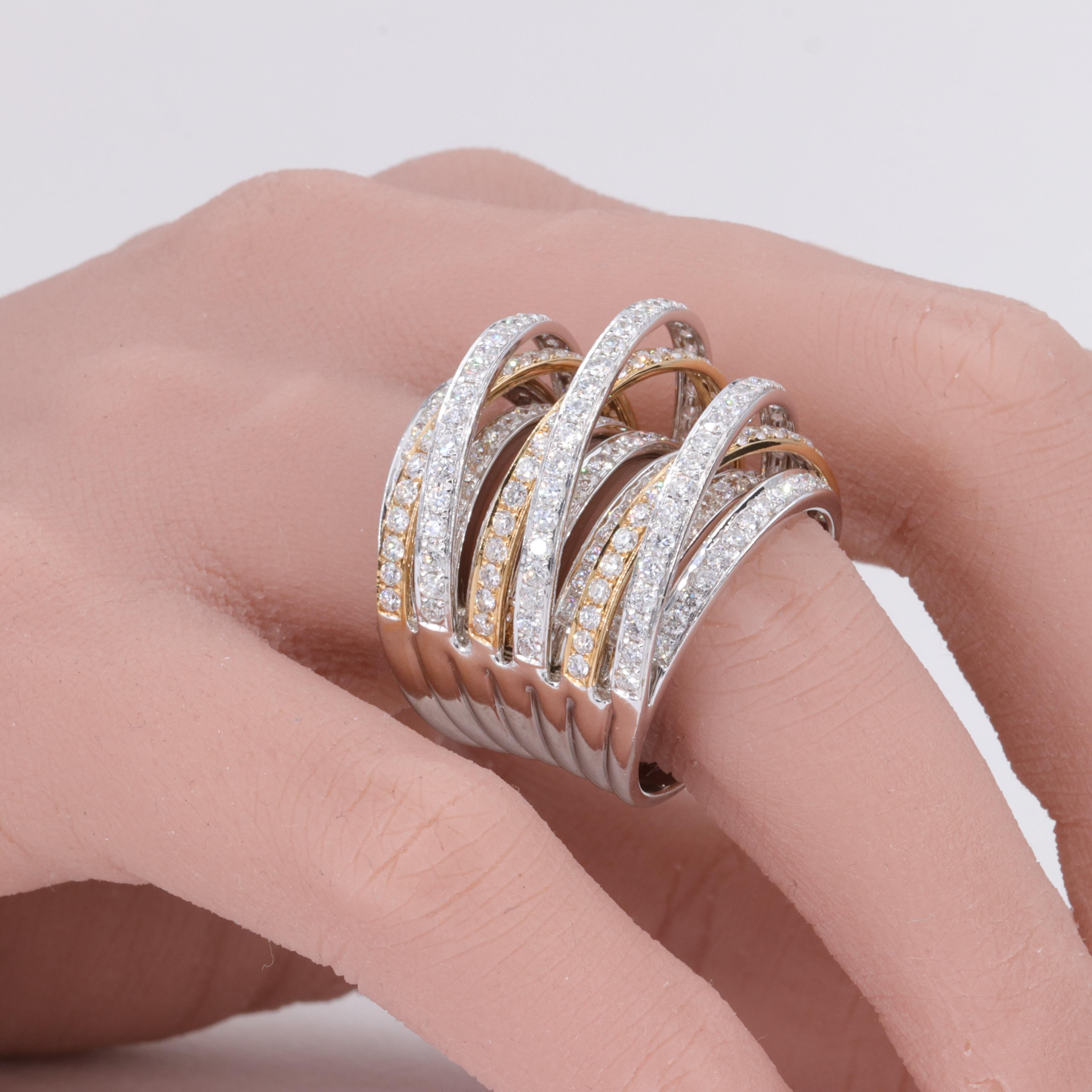 4.52 Carat Diamond Multi Row 18 Karat White & Yellow Gold Cocktail Ring Band

Diamonds: 

Weight - 236 Stones - 4.52 Carats 
Colors - D to G
Clarities - VS1 to SI1

Ring:

Metal - 18 Karat Yellow & White Gold
Weight - 18.9 Grams 
Length - 1