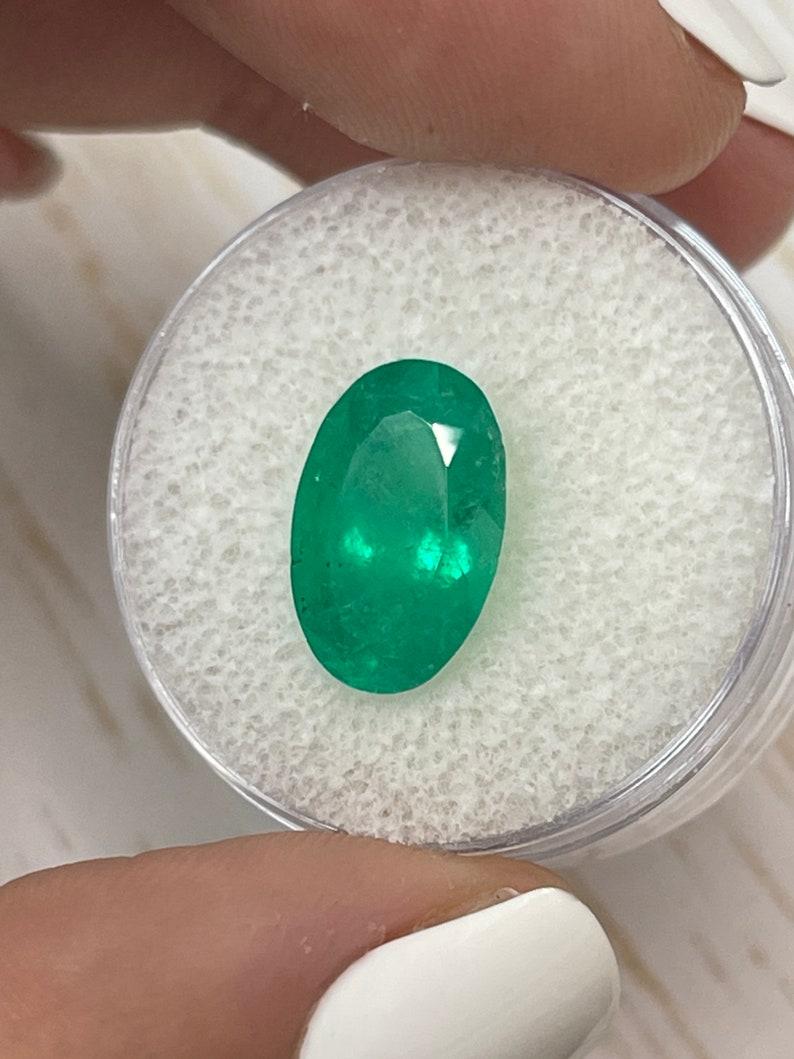 Modern 4.52 Carat Grassy Green Colombian Emerald Oval Cut - May Birthstone Gem For Sale