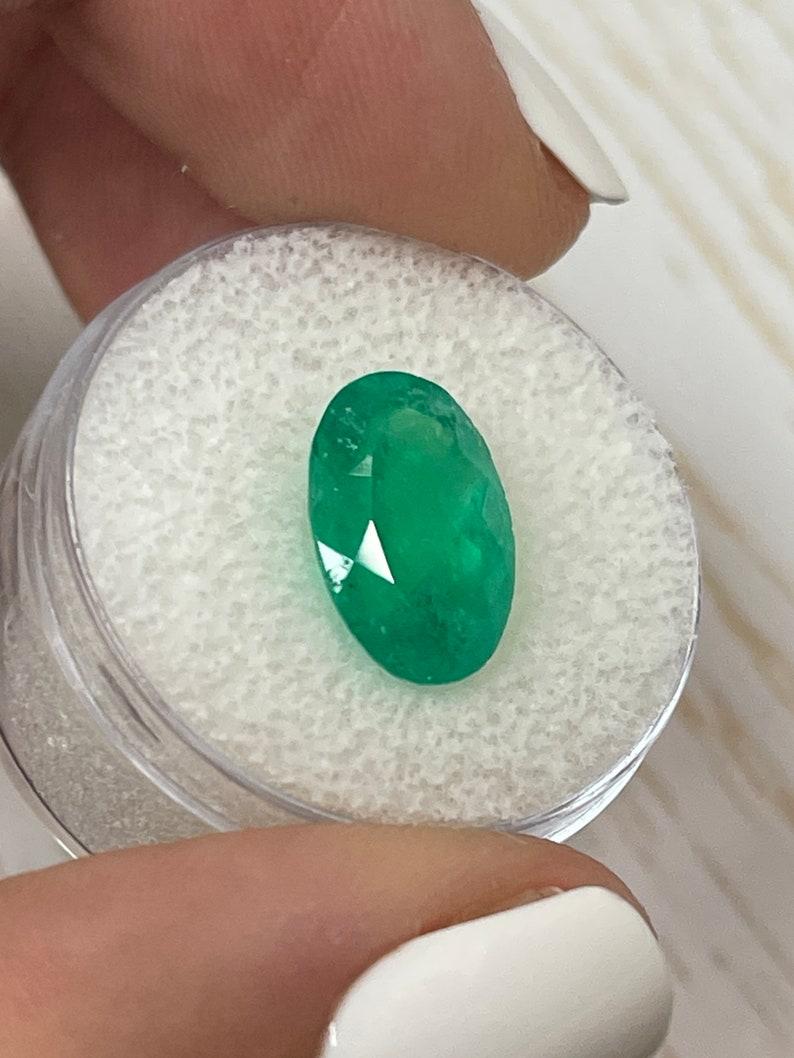Women's or Men's 4.52 Carat Grassy Green Colombian Emerald Oval Cut - May Birthstone Gem For Sale