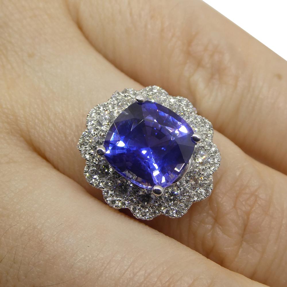  

Step into elegance with our breathtaking Cushion-Cut Sapphire and Diamond Ring, a testament to grace and allure. At its core lies a captivating cushion-cut sapphire, boasting a weight of 4.52 carats. This sapphire, with its transparent clarity