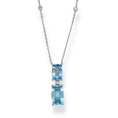 Boucles d'oreilles or blanc 4.53 carats aigue-marine diamant rond