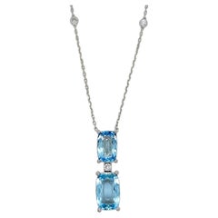 Boucles d'oreilles or blanc 4.53 carats aigue-marine diamant rond