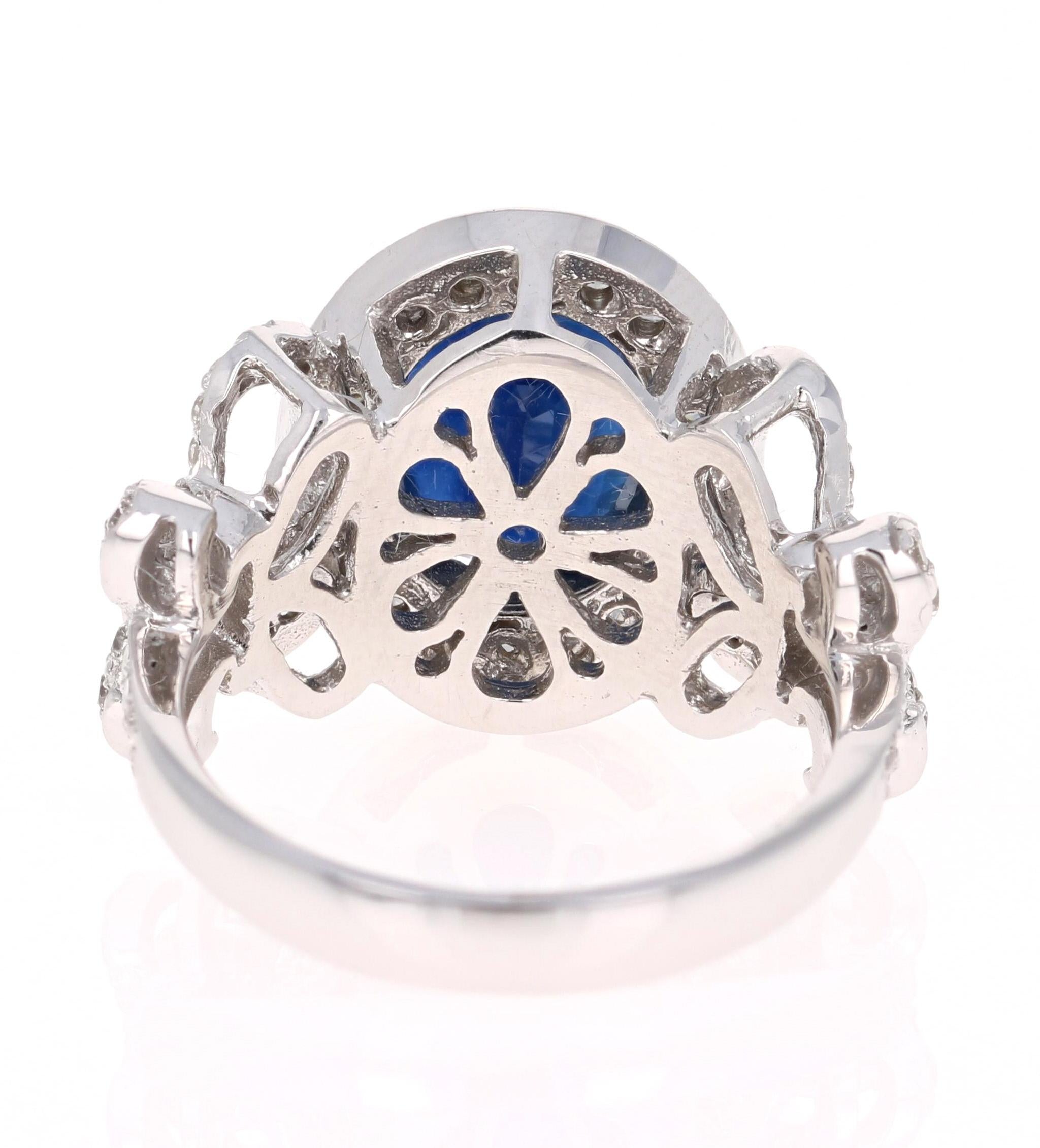 Oval Cut 4.53 Carat Blue Sapphire Diamond 14 Karat White Gold Ring