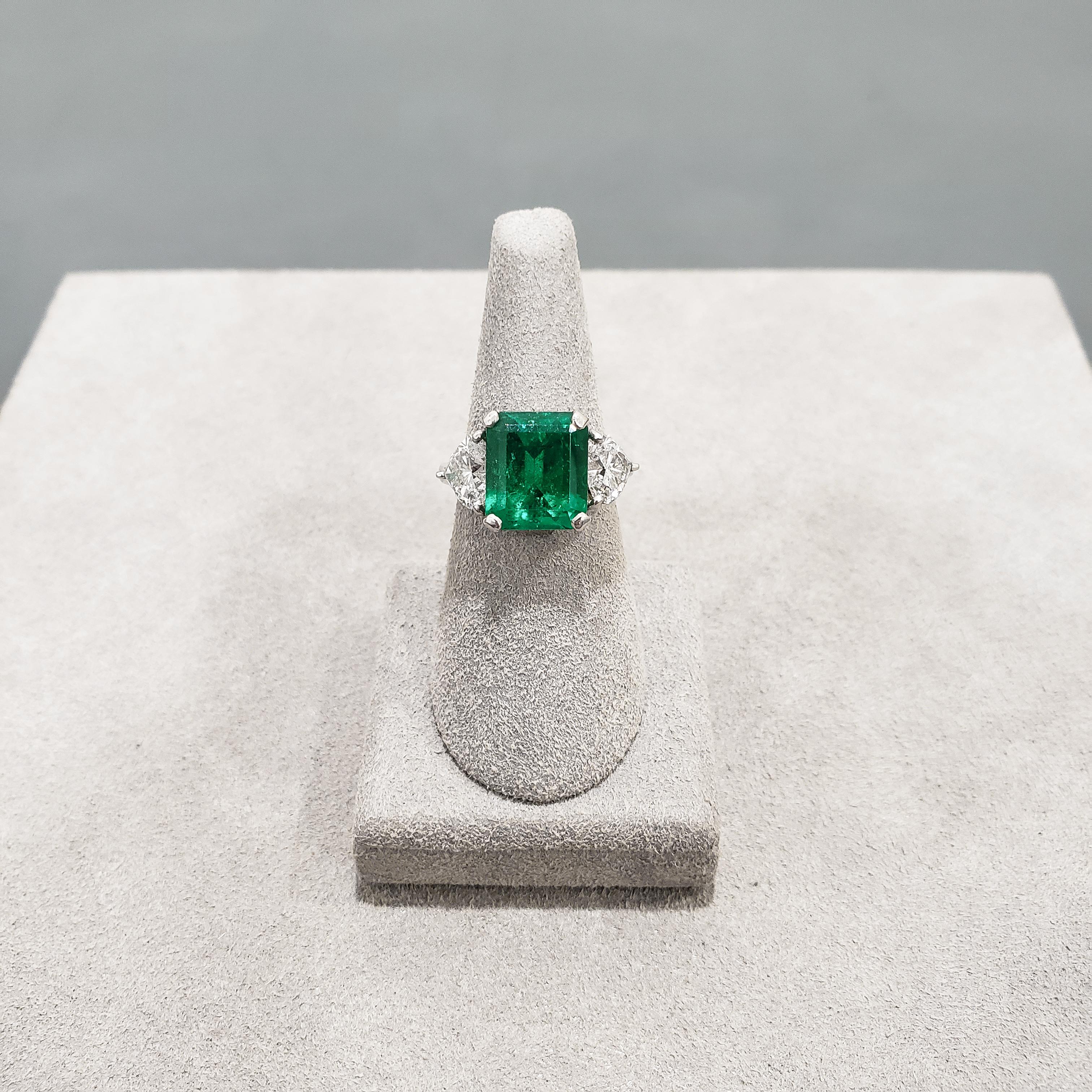 Contemporary 4.53 Carat Green Emerald and Diamond Three-Stone Engagement Ring