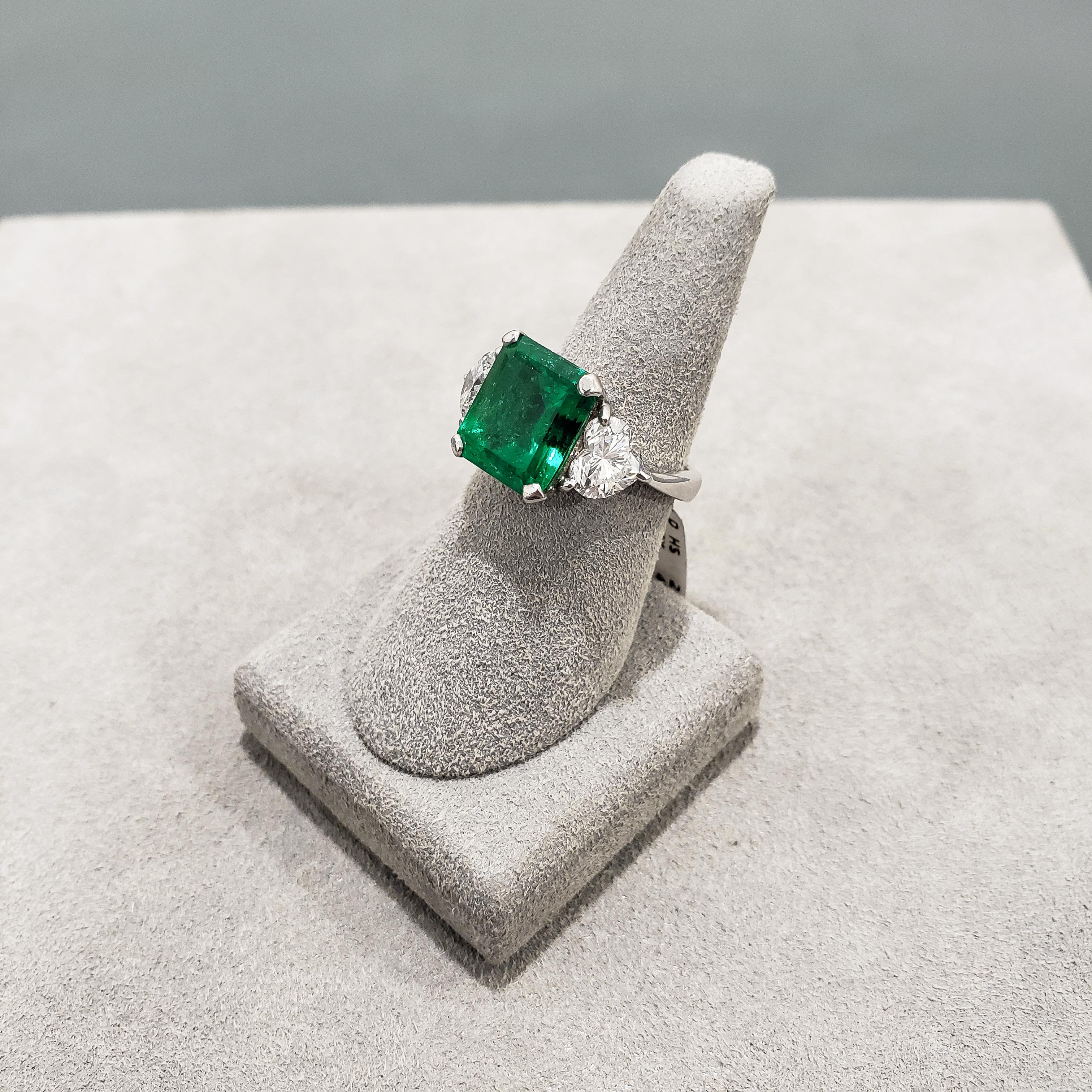 Emerald Cut 4.53 Carat Green Emerald and Diamond Three-Stone Engagement Ring