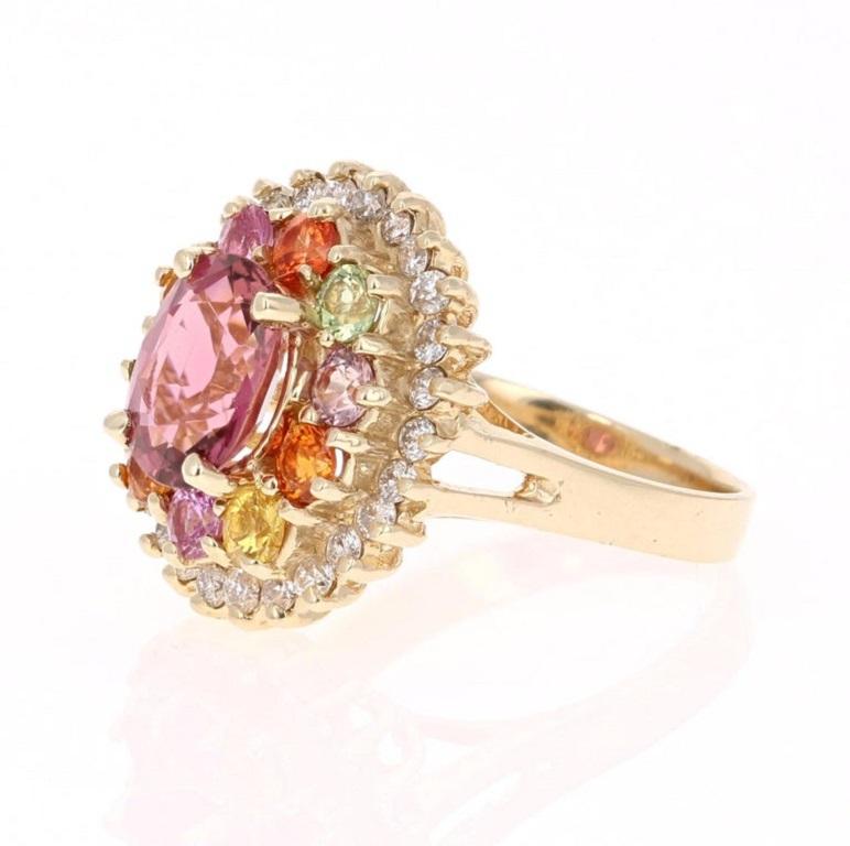 Oval Cut 4.53 Carat Tourmaline Sapphire Diamond Yellow Gold Cluster Ring For Sale