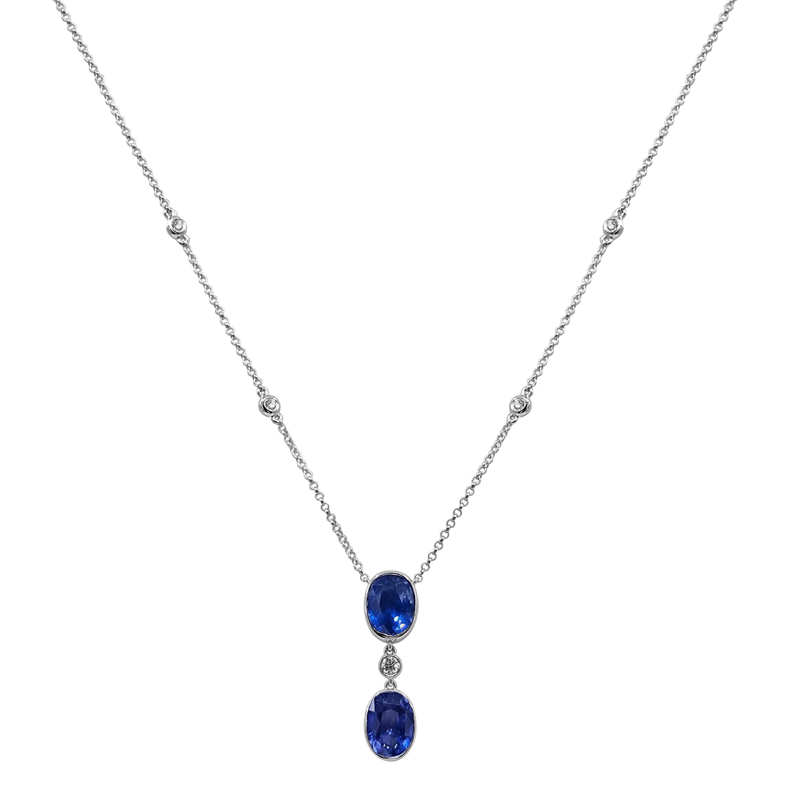 2 Sapphire Gemstones: 4.38 Carats
5 White Diamonds: 0.15 Carats
Metal: 18K White Gold, 4.60 Grams

