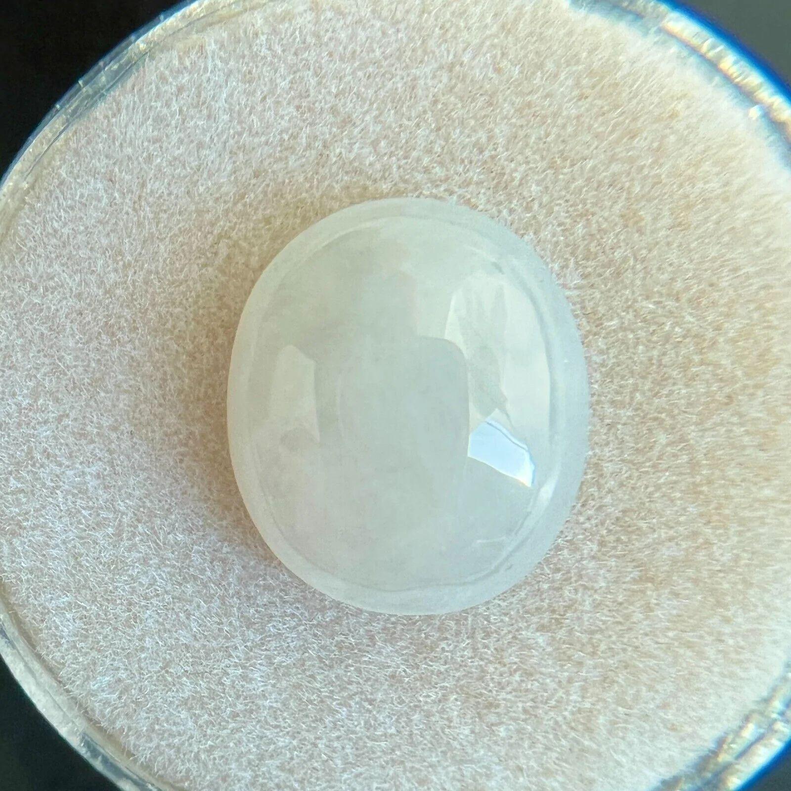 4.53ct White Jadeite Jade IGI Certified ‘A’ Grade Oval Cabochon Rare Gem

IGI Certified Untreated A Grade White Jadeite Gemstone.
4.53 Carat with an excellent oval cabochon cut. Fully certified by IGI in Antwerp, one of their best and most well