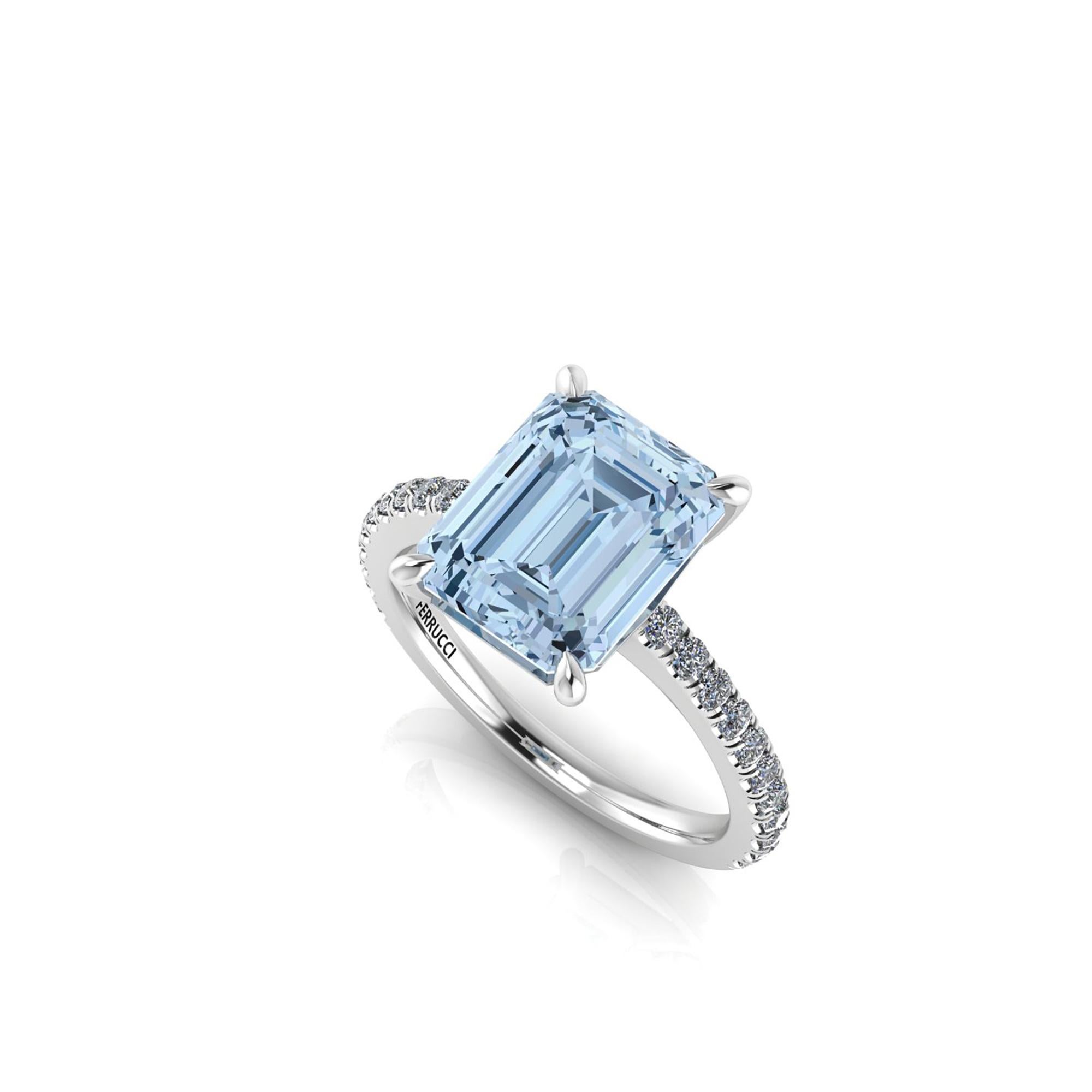 4.54 carat Aquamarine, emerald cut, very high quality color, eye clean gem, accompanied a pave' of bright diamonds of approximately  total carat weight of 0.38 carat, set in an hand crafted, delicate and sophisticated looking Platinum 950 ring,
