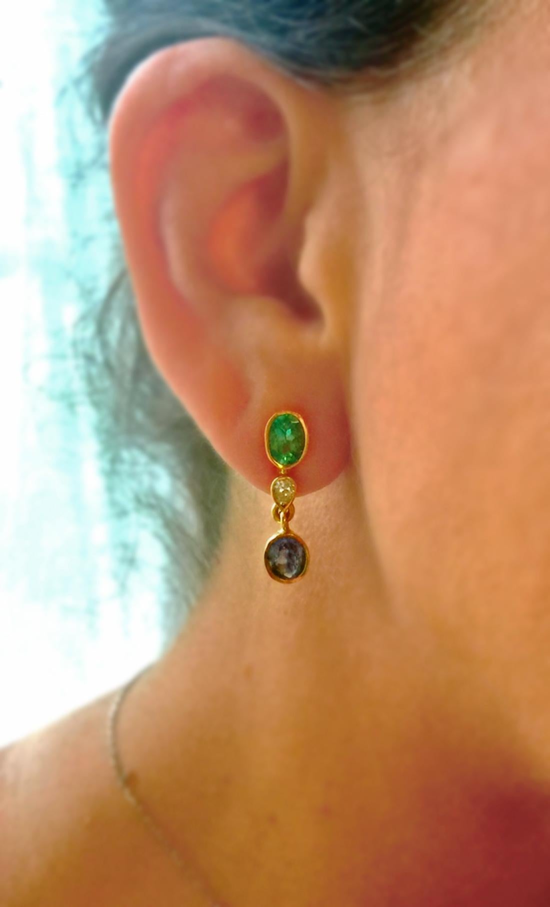 4.55 Carat Colombian Emerald Tanzanite and Diamond Drop Dangle Earrings 18K 
This ELEGANT pair of earrings feature two natural Colombian Emerald oval cut 1.75ct medium light green VS, two natural diamond pear cut 0.50ct VS and two natural Tanzanite