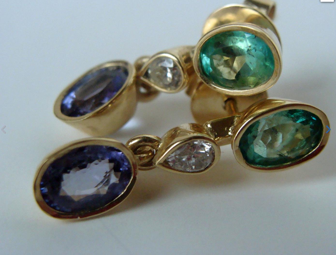 Oval Cut 4.55 Carat Colombian Emerald Tanzanite and Diamond Dangle Earrings 18 Karat For Sale