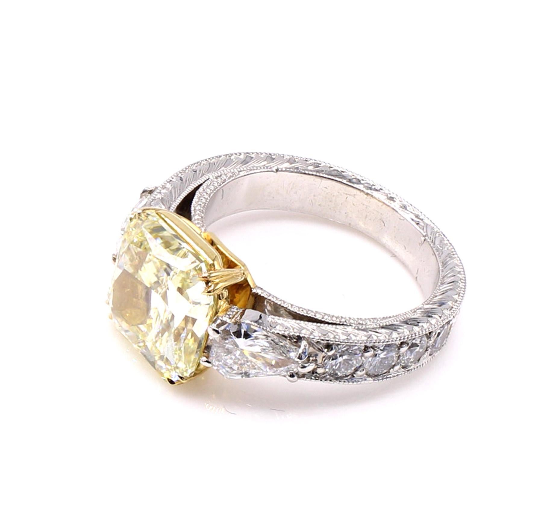 4.55 Carat Fancy Yellow Radiant Cut Diamond Platinum 18 Karat Yellow Gold Ring For Sale 1