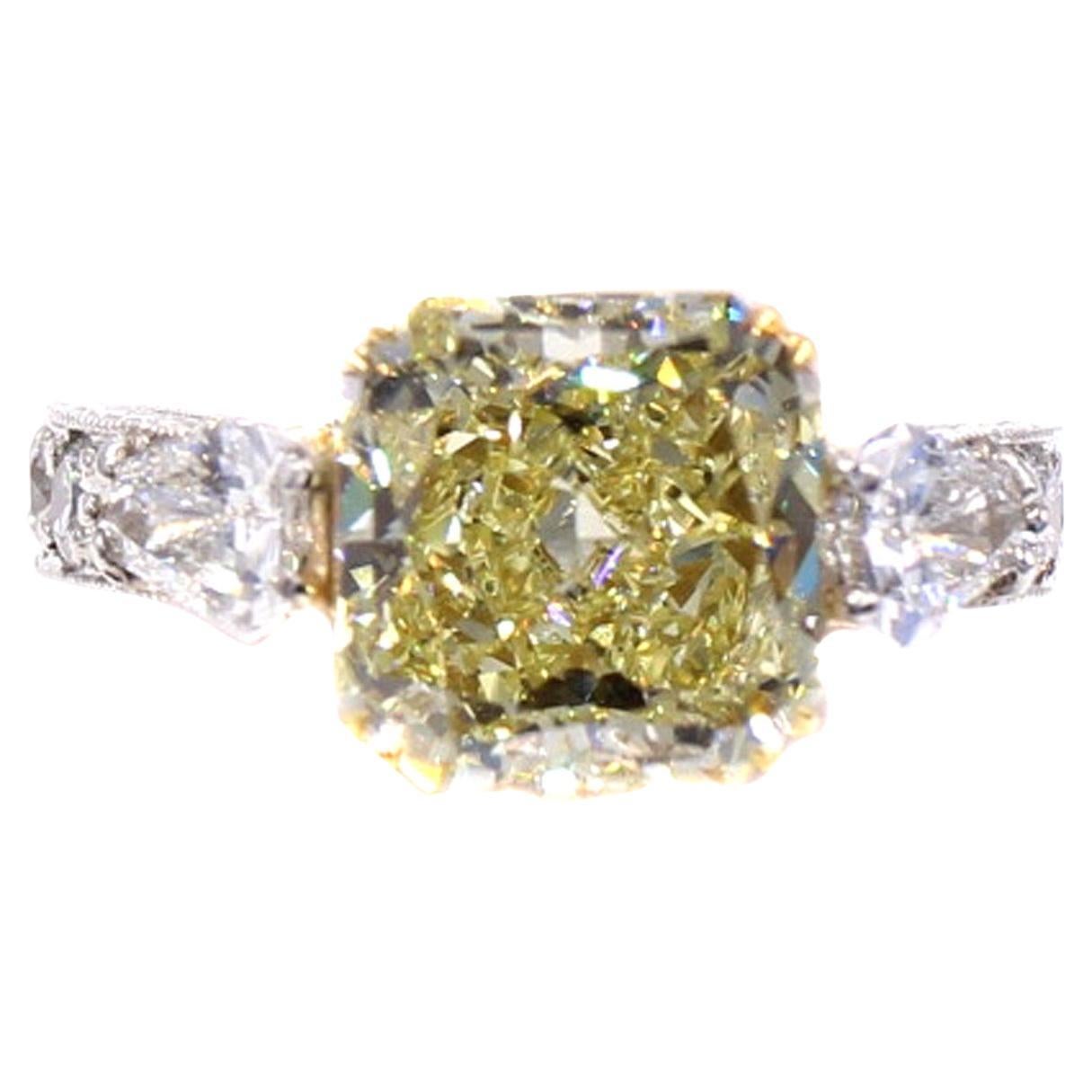 4.55 Carat Fancy Yellow Radiant Cut Diamond Platinum 18 Karat Yellow Gold Ring For Sale