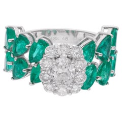 Anello con smeraldo dello Zambia da 4,55 carati e pera 1,62 carati. Diamante SI/H Oro bianco 18 carati