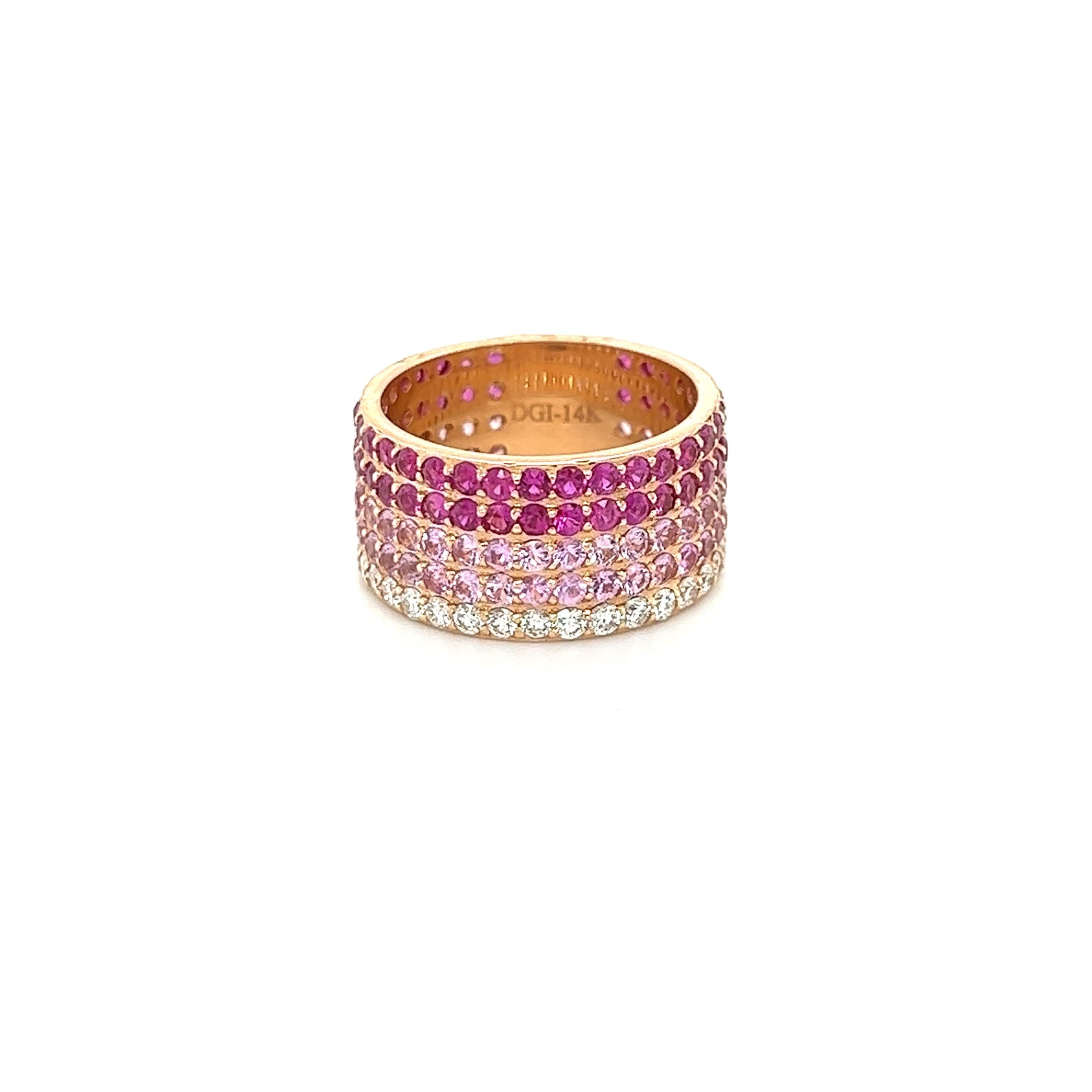 This ring has Natural Pink Sapphires weighing 3.80 carats and Natural Round Cut White Diamonds weighing 0.75 carats. The total carat weight of the ring is 4.55 carats. 

Clarity and Color of Diamonds are VS-H. The Pink Sapphires range from light to