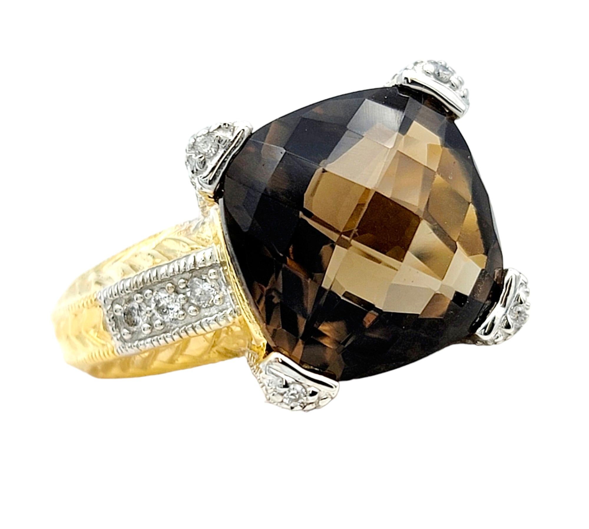 Ring size: 6.75

Introducing our stunning cushion checkered cut smokey quartz ring, a captivating piece that effortlessly blends elegance with a touch of modern flair. Set in lustrous 14k yellow gold, this ring boasts a textured detail with a chic