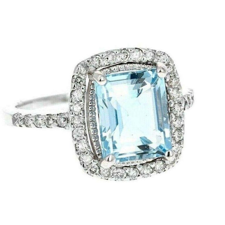 4.55 Carats Natural Aquamarine and Diamond 14K Solid White Gold Ring

Total Natural Emerald Cut Aquamarine Weights: Approx. 4.00 Carats

Aquamarine Measures: Approx. 11 x 9mm

Aquamarine Treatment: Heat

Natural Round Diamonds Weight: Approx. 0.55