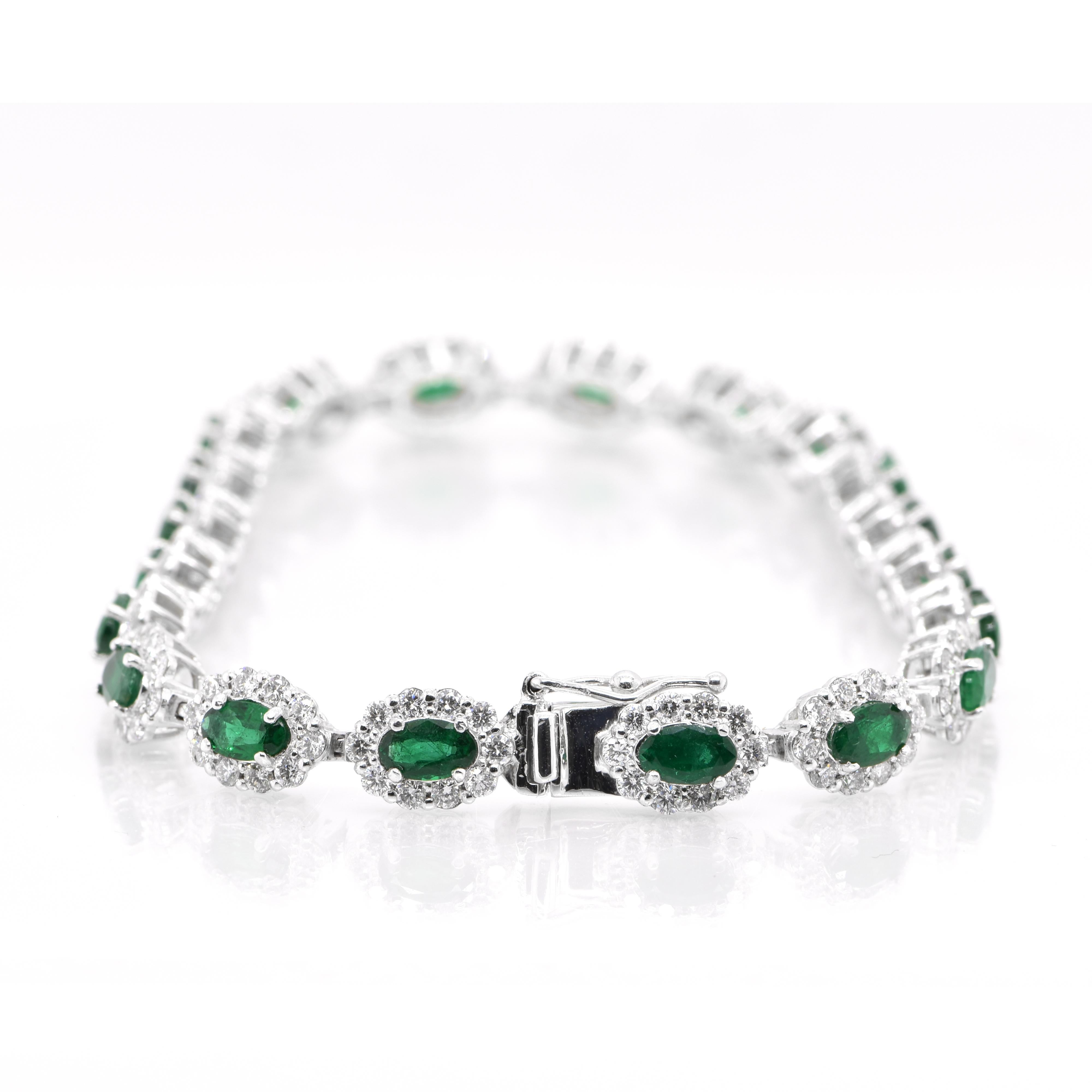 Oval Cut 4.55 Carats, Natural Emeralds and Diamond Tennis Bracelet Set in Platinum
