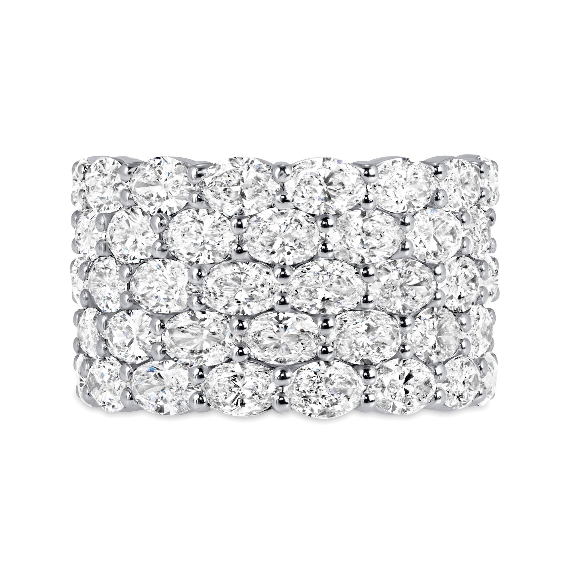 Oval Cut Diamond Wide Five Row Ring in Platinum. This unique ring has 38 Oval shape diamonds in F color, VS clarity beautifully set in five rows in shared double prongs, weighing an approximately 4.48 carats in total.
