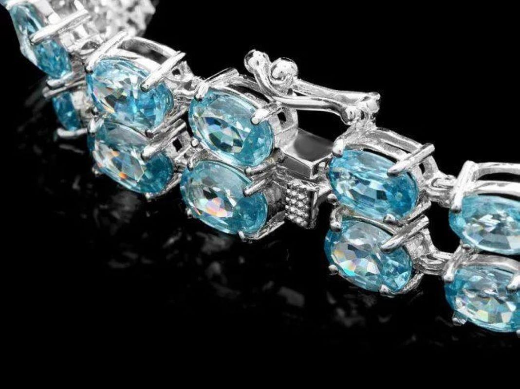 45.50 Natural Zircon and Diamond 14K Solid White Gold Bracelet

Total Natural Zircon Weight is: Approx. 44.00 carats 

Zircon Measure: Approx. 7x5 - 9x7 mm

Total Natural Round Diamonds Weight: Approx. 1.50 Carats (color G-H / Clarity