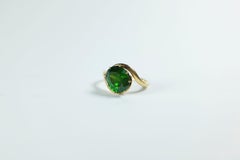 4.55 Carat Russian Demantoid, mounted on 18 Karat Gold ring.